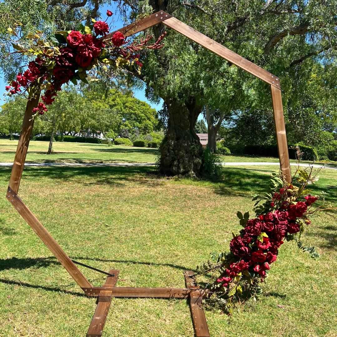 Quinn's Heptagon Floral Arch - Permanence Decor Rentals