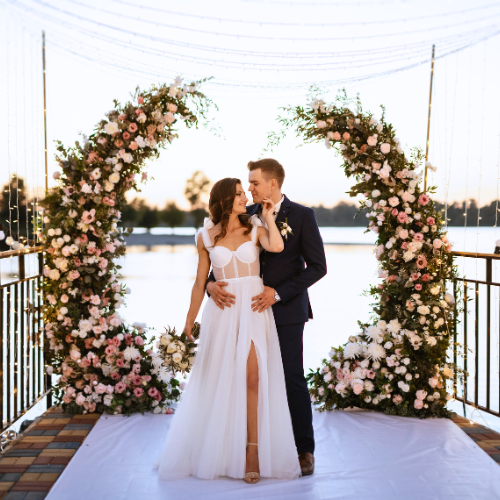 
                      
                        Daphne's Columns Wedding Arch - Permanence Decor Rentals
                      
                    