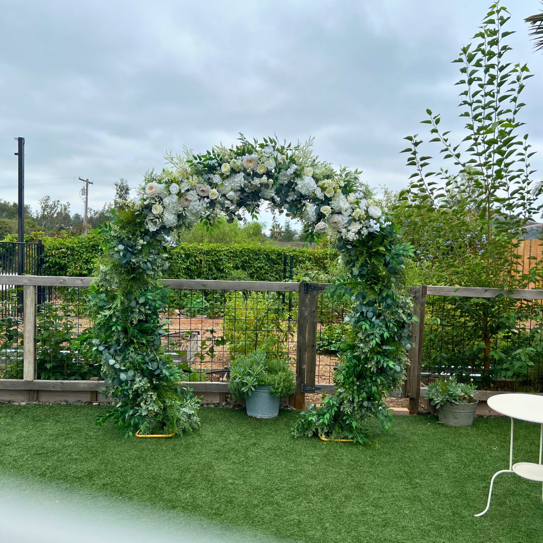 Hailey's Tropical Wedding Arch - Permanence Decor Rentals